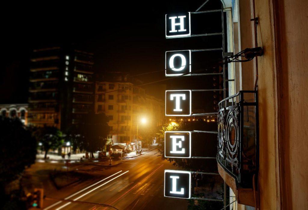 Illuminated Hotel Sign at Night